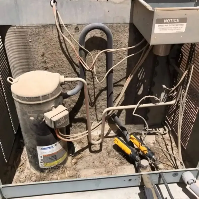 AC compressor before maintenance showing dirt and wear from Las Vegas heat