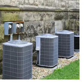 Outdoor AC condenser units at a Summerlin home with dual cooling systems