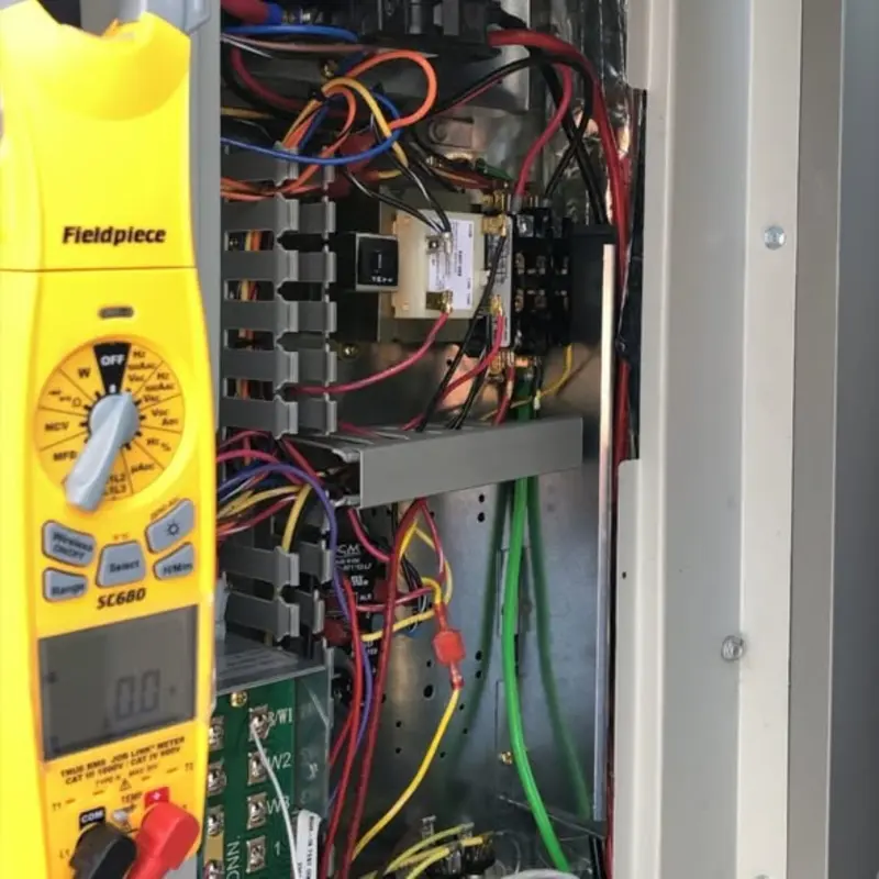 Fieldpiece clamp meter diagnosing HVAC electrical in Las Vegas